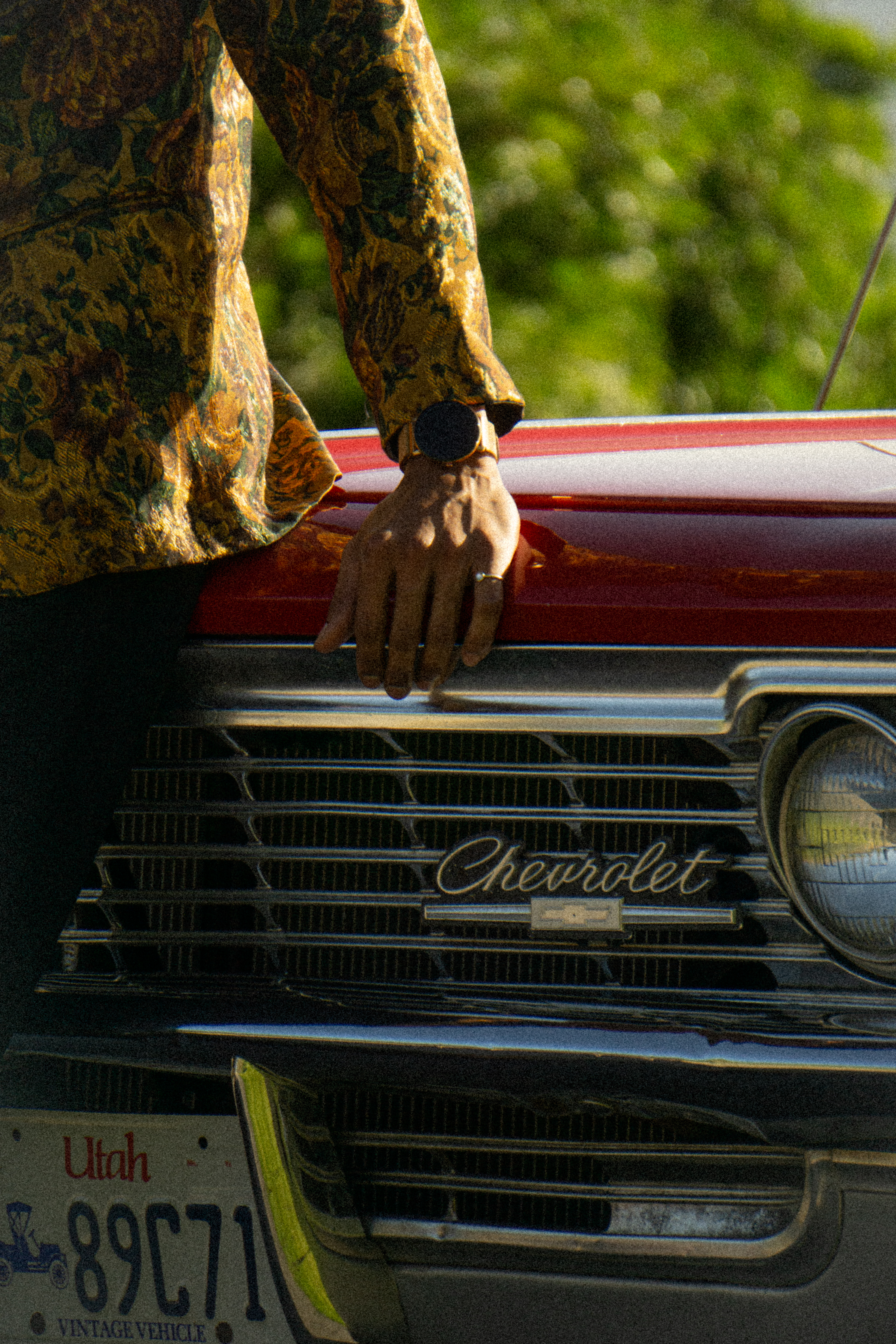 Lifestyle — Hand resting on a classic Chevrolet
