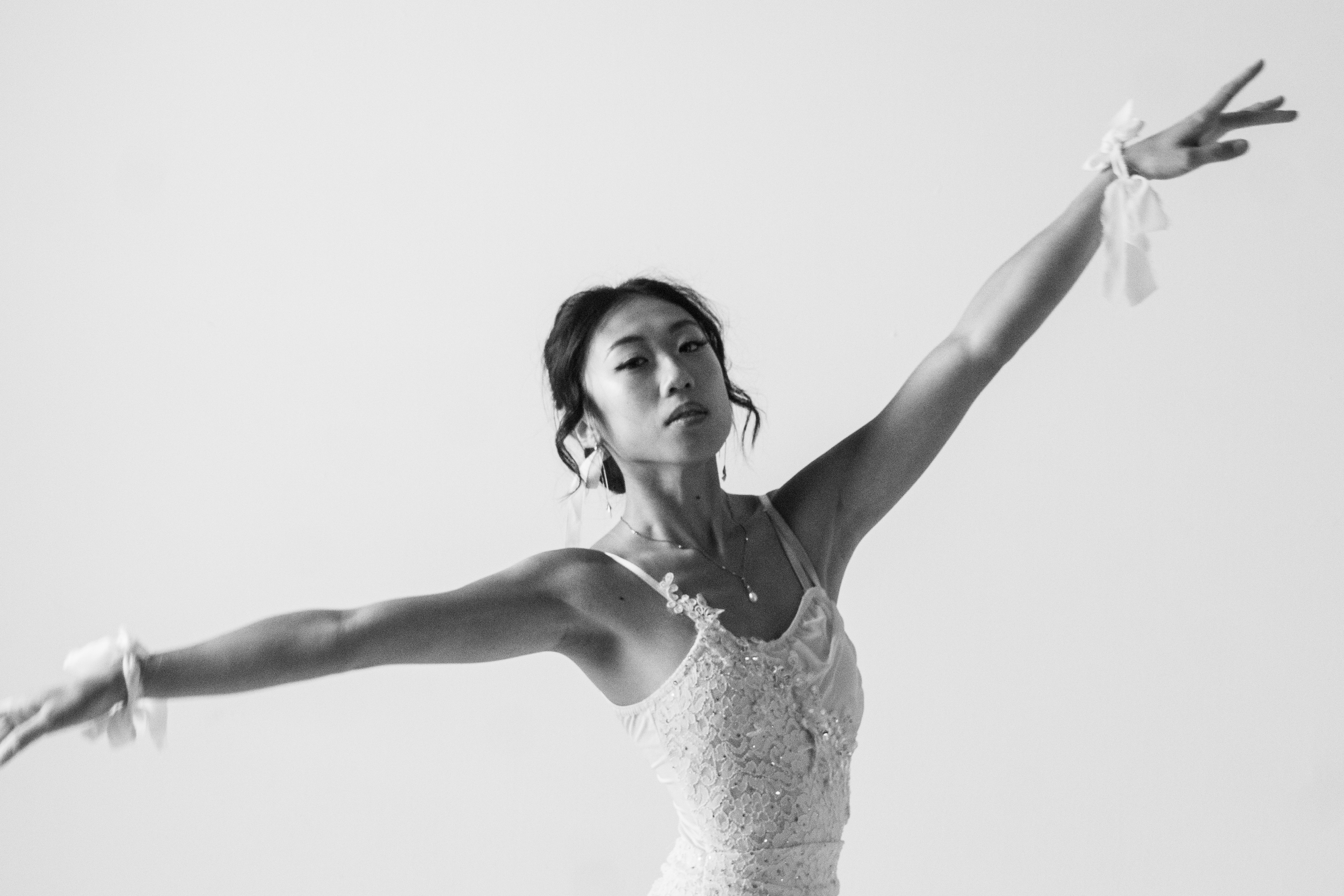 Fashion — Ballerina with arms outstretched in black and white