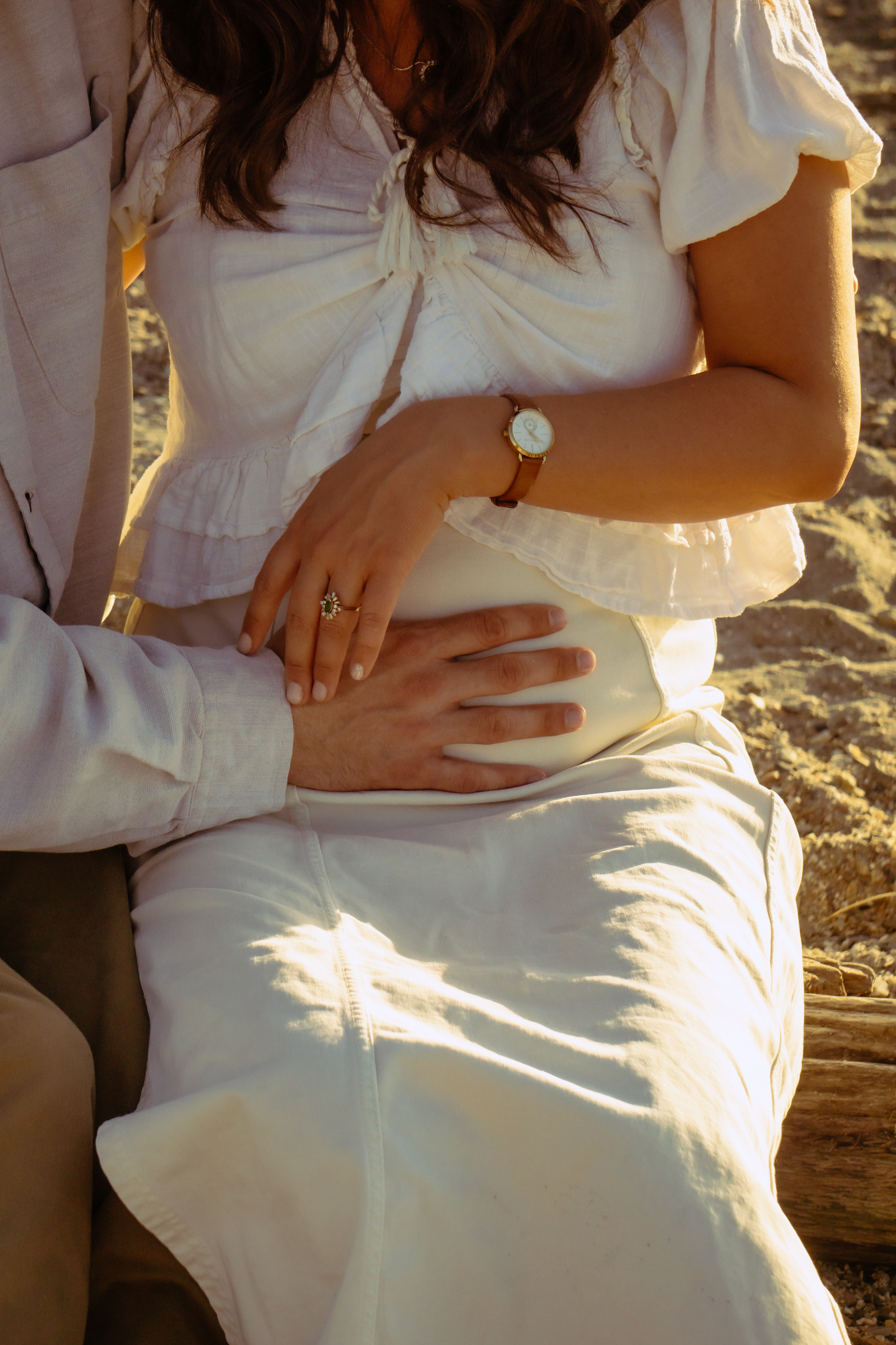 Family — Hands tenderly holding the expectant belly